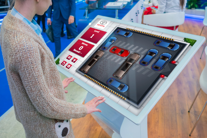 Why do brands use trade show games?